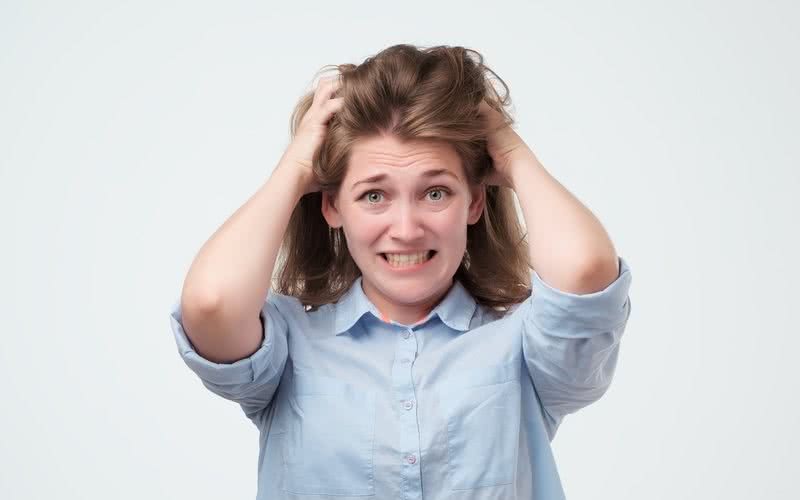 Seguidora reclama de oleosidade no cabelo - iStock