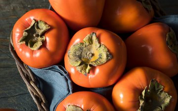O caqui tem alta concentração de vitaminas A e C, além de licopeno - iStock